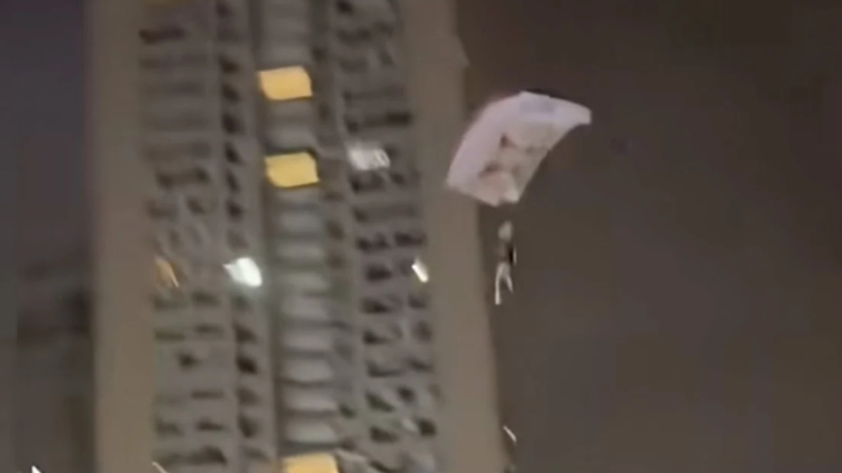 Chinese man detained after illegal skydiving stunt from residential building
