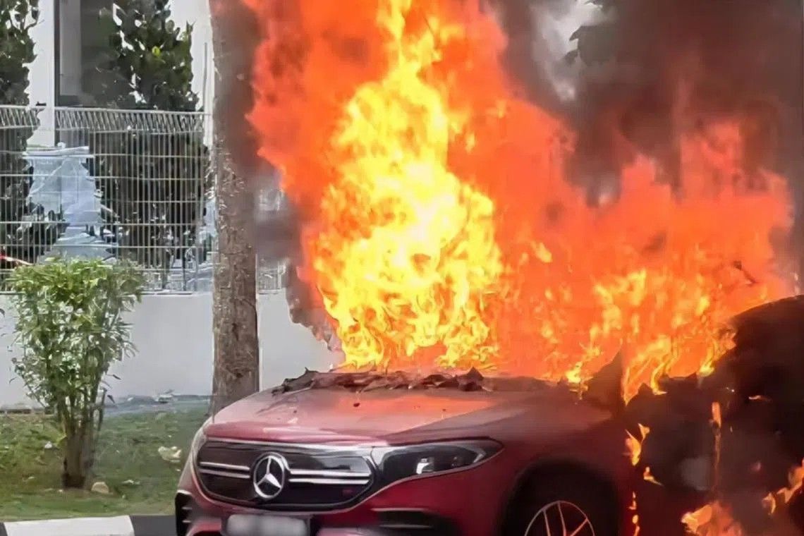 Electric vehicle erupts in flames at Woodlands HDB carpark; authorities probe battery fire incident