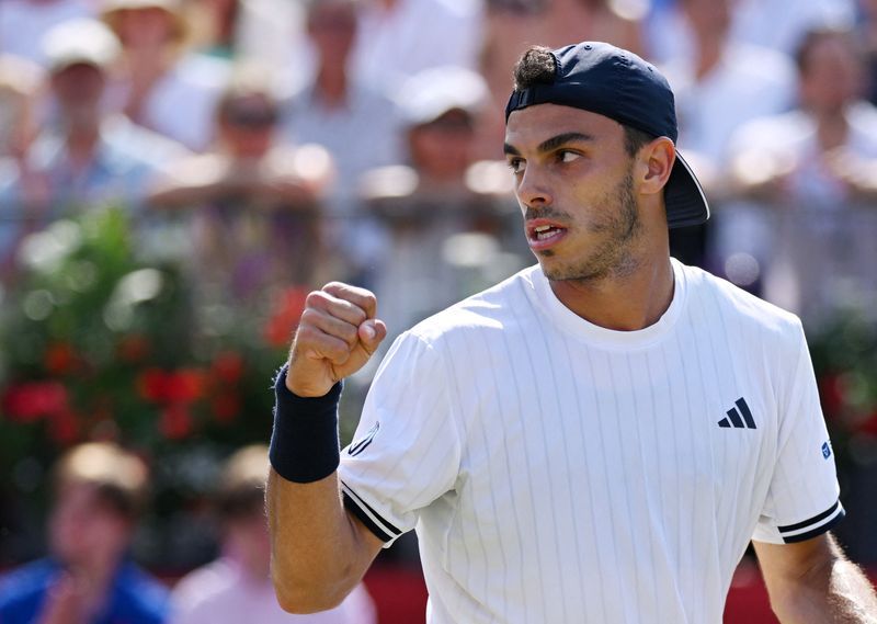 Cerundolo Claims Queen's Crown in Epic Grass-Court Showdown with Paul