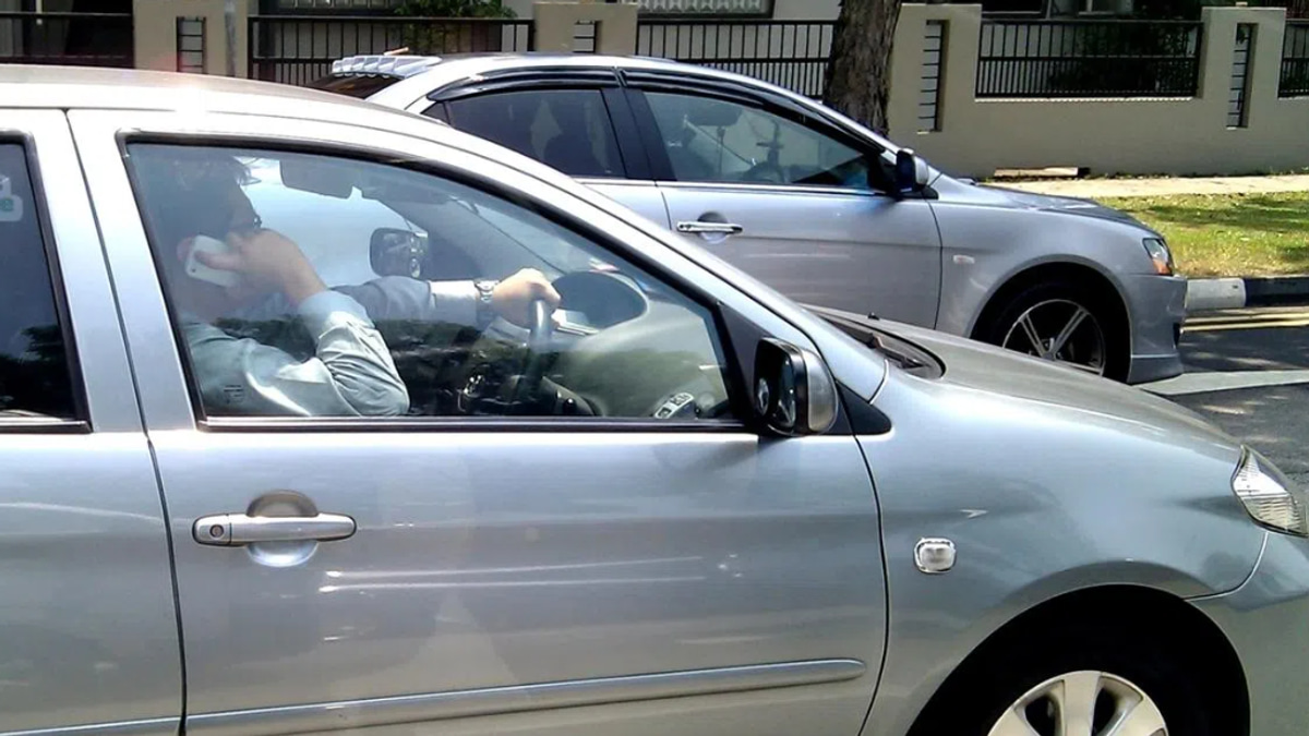 Singapore tightens traffic laws with jail terms for phone use while driving