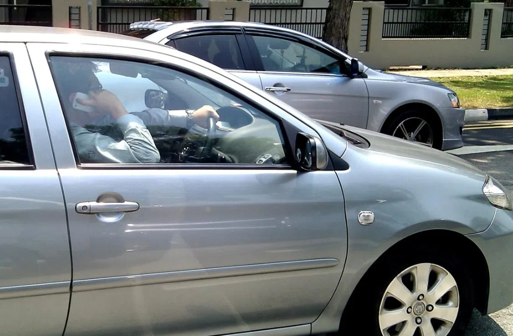 Singapore tightens traffic laws with jail terms for phone use while driving