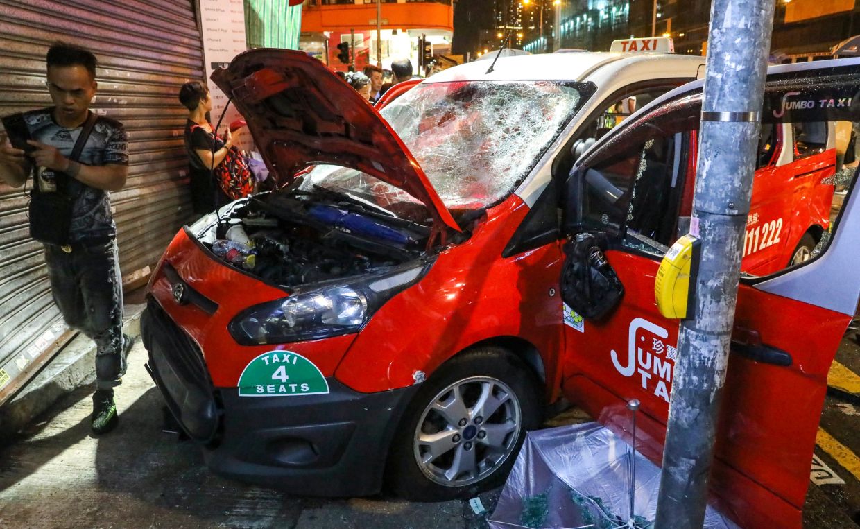 Hong Kong Woman Seeks HK$8.4M Damages After Taxi Hit Her During 2019 Protest