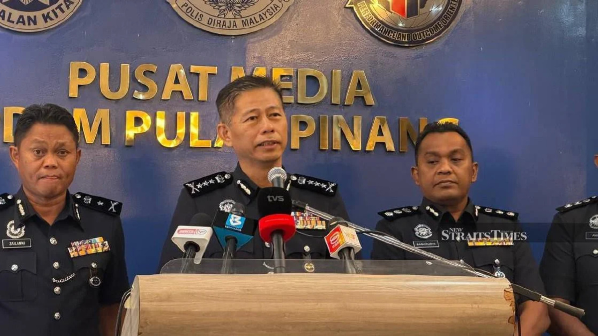Penang police arrest 12 men, seize RM9,000 in illegal World Cup betting sweep